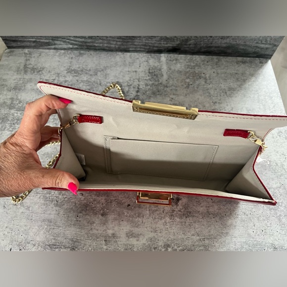 Gorgeous BCBG red patent clutch with gold strap. NWOT - Picture 2 of 5